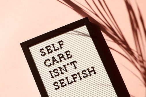 Self-care-isn't-selfish-text-on-a-board