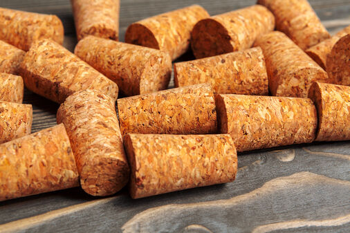 Wine corks scattered about a table